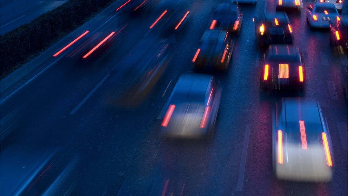 traffic at nightfall in city