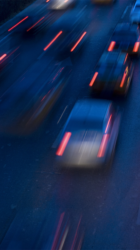 traffic at nightfall in city