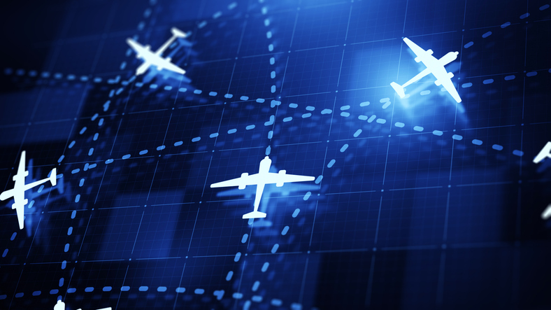 Air traffic concept on digital blue background