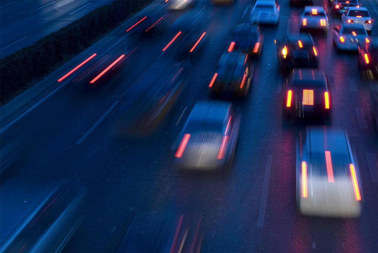 traffic at nightfall in city